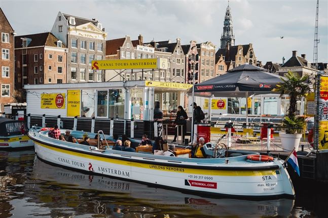  Canal Tours Amsterdam ubicación en Damrak Pier 6