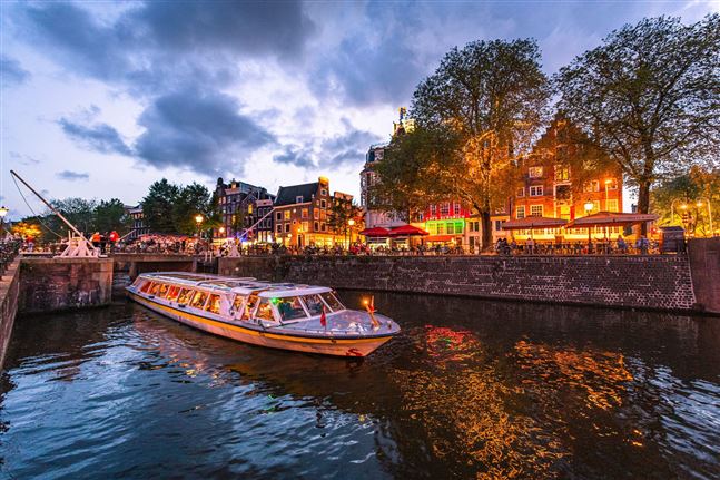 Crucero nocturno en gin tonic por los canales de Ámsterdam