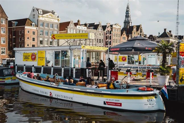 Canal Tours Amsterdam location at Damrak Pier 6 in